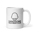 White mug with Handsome Bald Men's Club text and bald head logo.