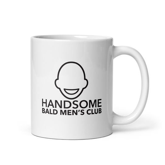 White mug with Handsome Bald Men's Club text and bald head logo.